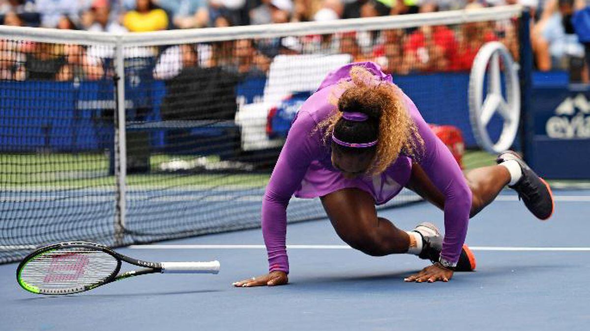 Serena Williams, of the United States, falls while chasing a return to Petra Martic, of Croatia, during round four of the US Open tennis championships Sunday, Sept. 1, 2019, in New York. (AP Photo/Sarah Stier)