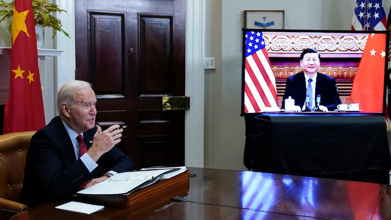 FILE PHOTO - President Joe Biden meets virtually with Chinese President Xi Jinping from the...