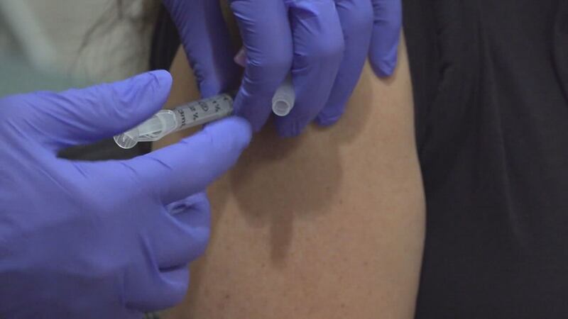 Here at home, vaccination rates are staying the course with more than half the population...