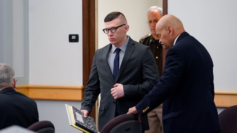 Volodymyr Zhukovskyy, of West Springfield, Mass., center, charged with negligent homicide in...