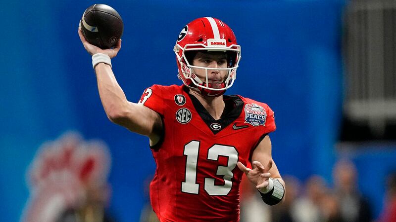 Georgia quarterback Stetson Bennett (13) passes the ball against Ohio State during the first...